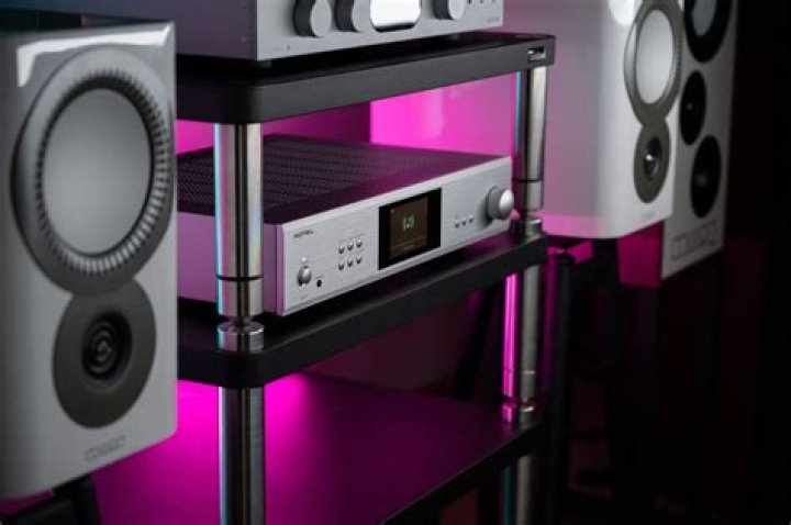 How are speakers set in an AV receiver?