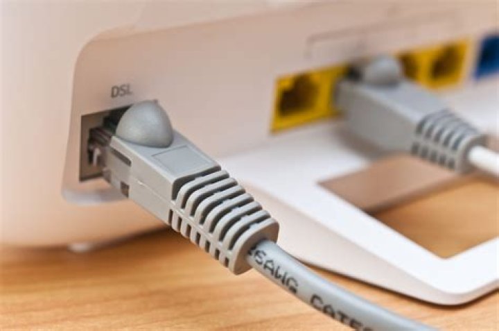 How do I connect my landline phone to my computer?