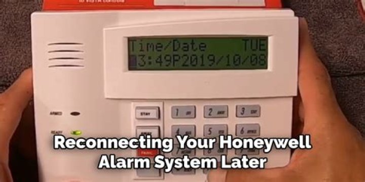 How do I disarm my Honeywell alarm system?