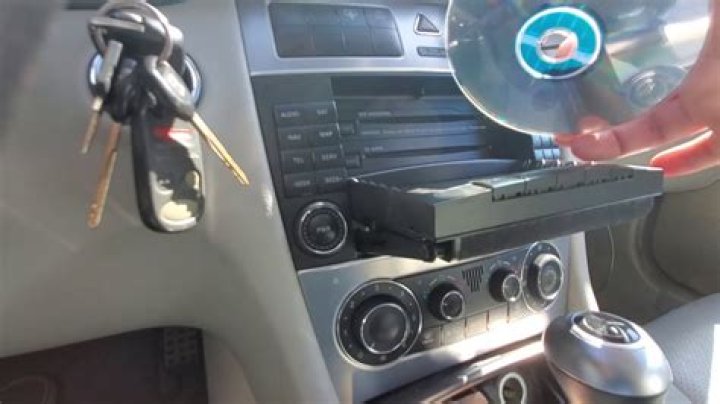How do I eject a CD from my Ford?