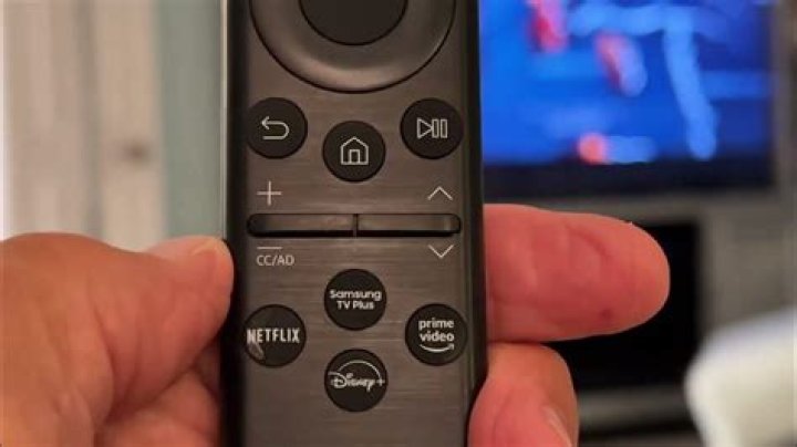 How do I lower the volume on my remote?
