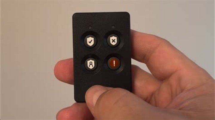 How do I program my ADT alarm key fob?
