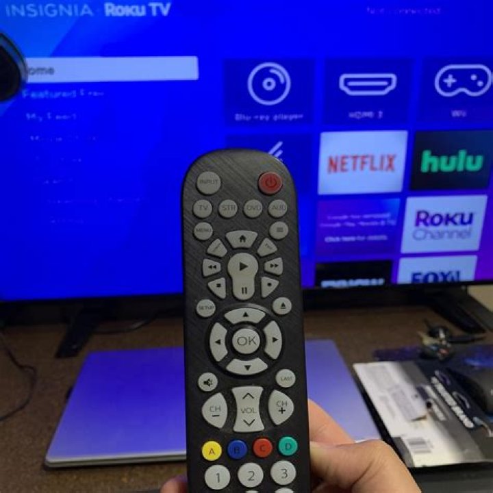 How do I program my Bose remote to my Insignia TV?