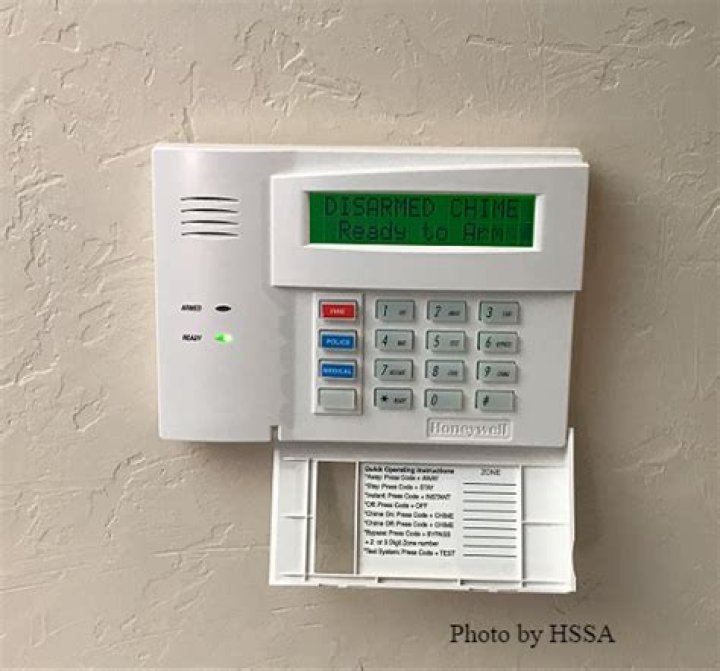 How do I reprogram my ADEMCO alarm system?