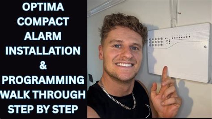 How do I turn on my Optima compact alarm?