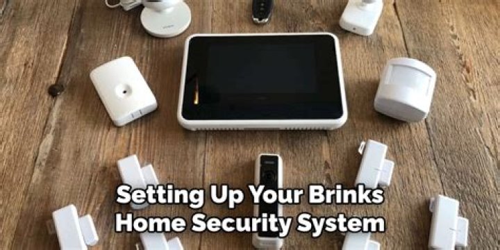 How do you activate a Brinks alarm system?
