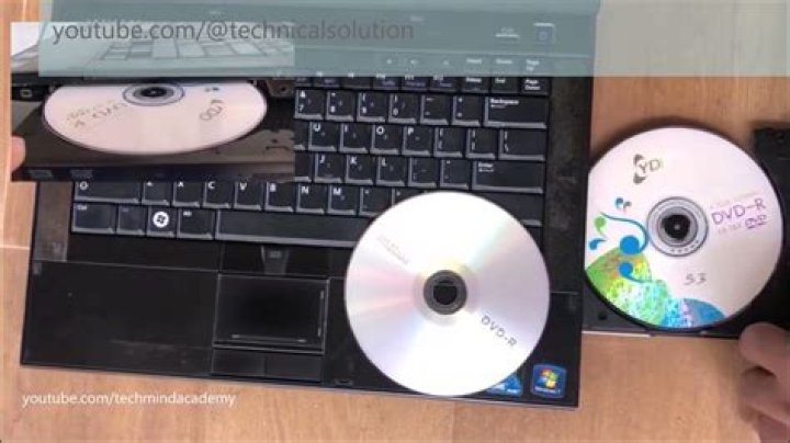 How do you clean a CD tray?