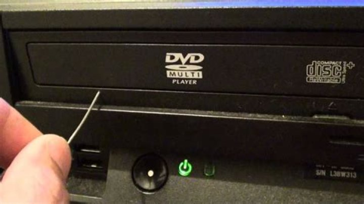 How do you get a stuck DVD out of a slot drive?