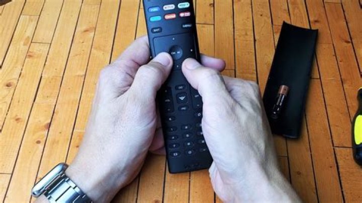 How do you program a Vizio soundbar remote?