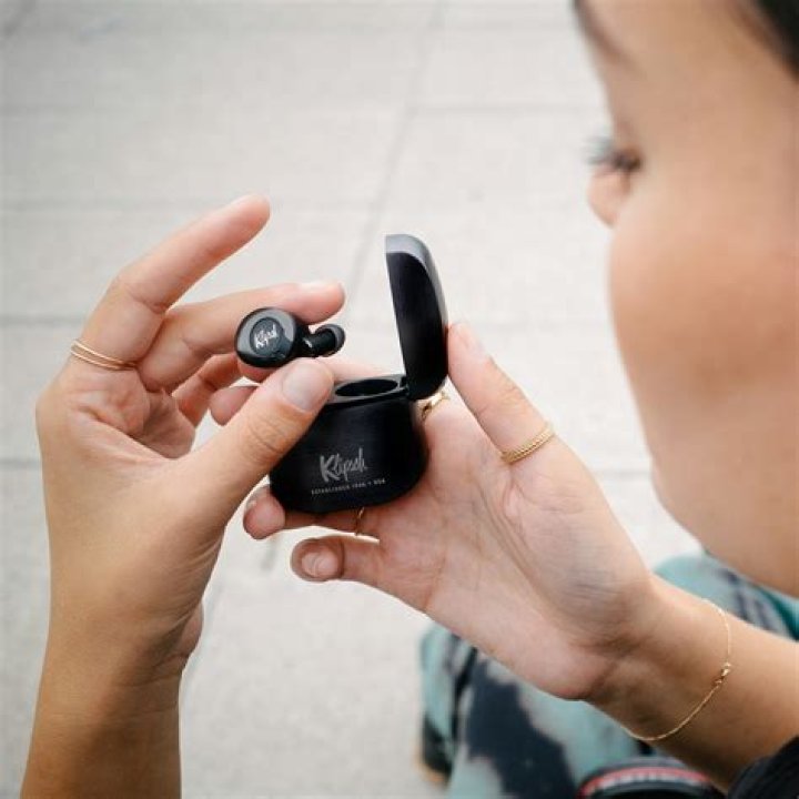 How do you put T5 True Wireless earphones into pairing mode?