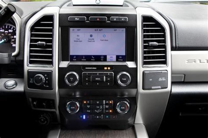 How do you reset the radio on a 2014 Toyota Tundra?