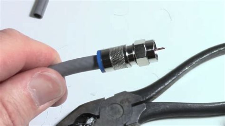 How do you unscrew a stuck coax cable?