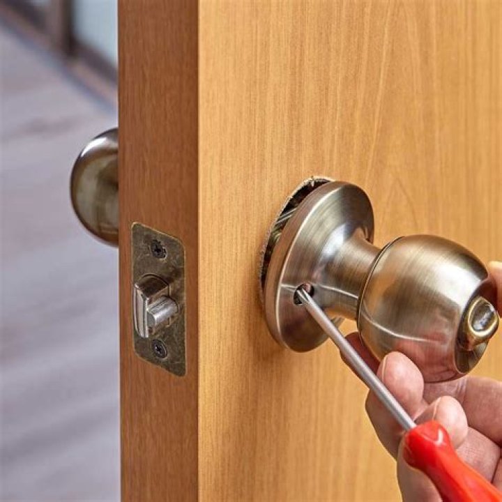 How much does a handyman charge to install a door knob?