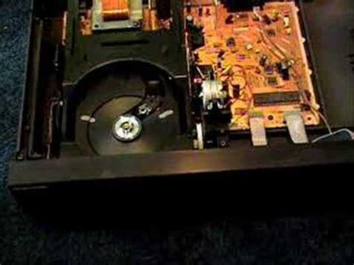 How to open a stuck CD player drawer?