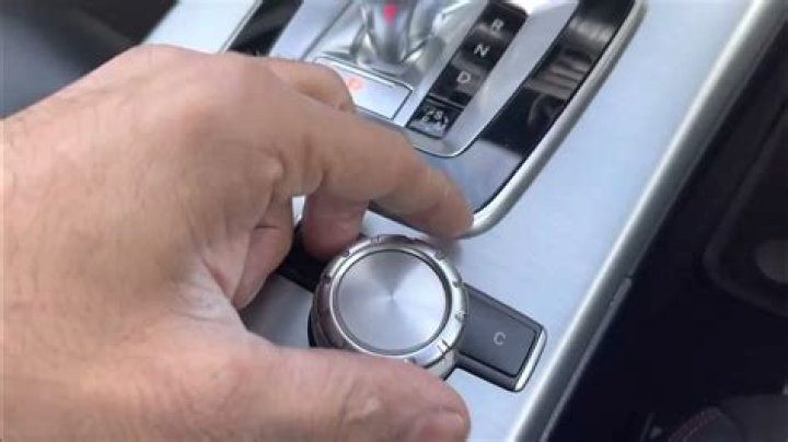 What causes a CD changer to jam when ejecting?