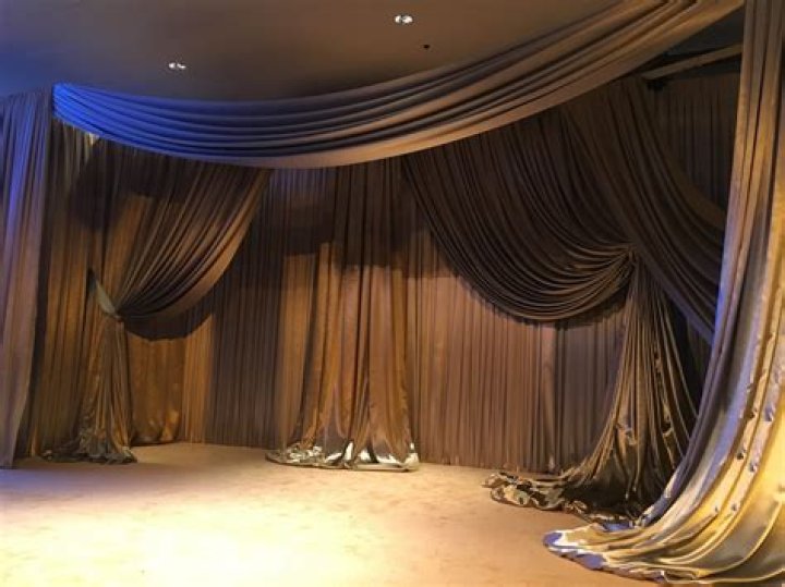 What fabric are stage curtains made from?