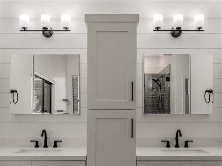 Where should vanity lights be placed?