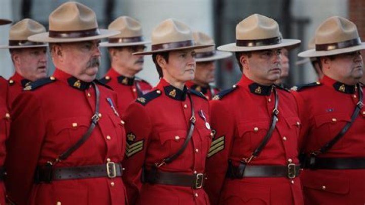 Why do Canadian Mounties wear red?