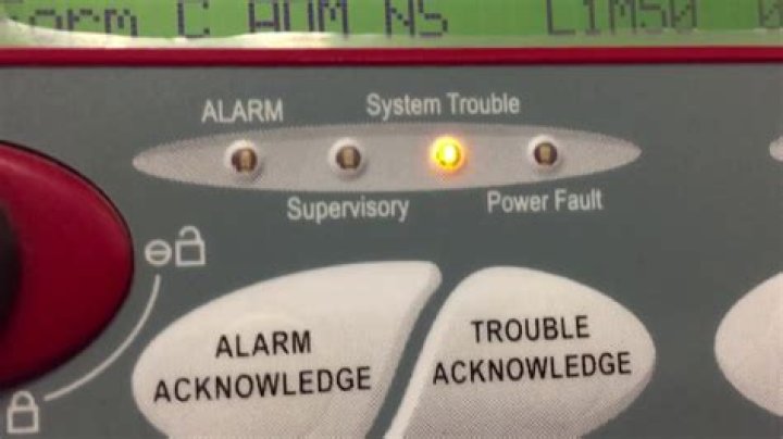 Why does my alarm system say trouble?