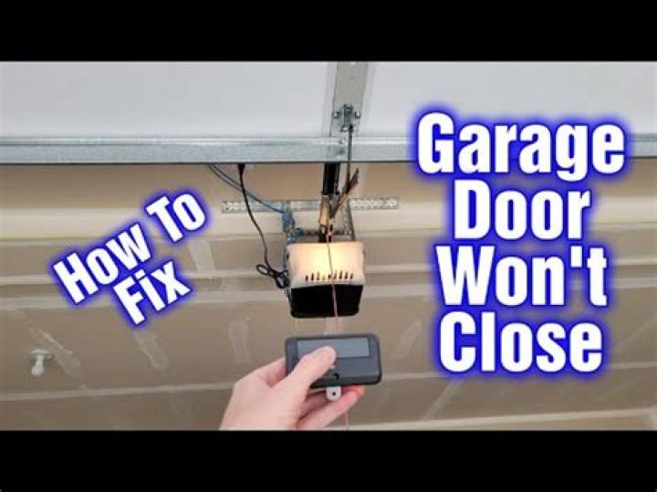 Why does my garage door not close in sunlight?