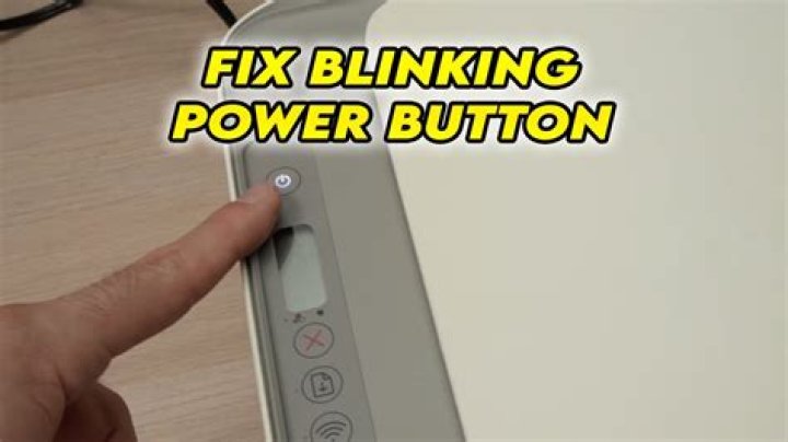 Why is my power on button blinking yellow?