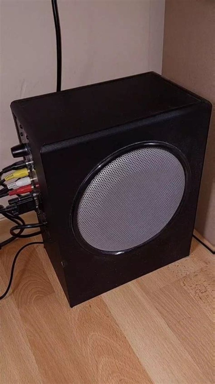 Why is my powered subwoofer humming?